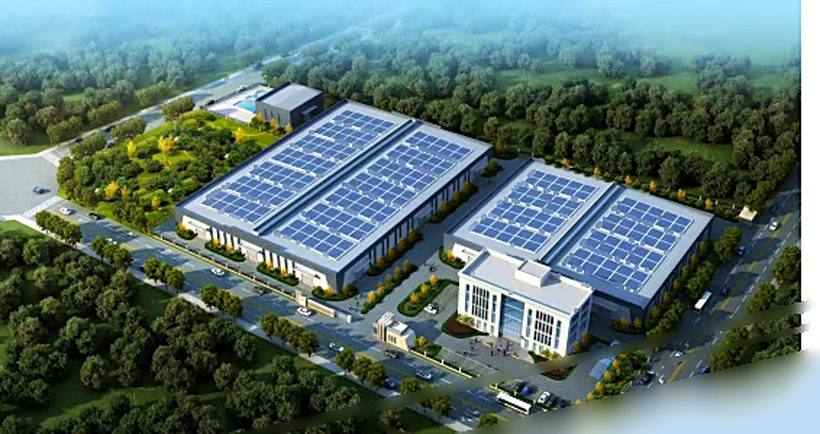 Aerial view of the plant: standardised workshops and the office building, with photovoltaic modules on the roofs